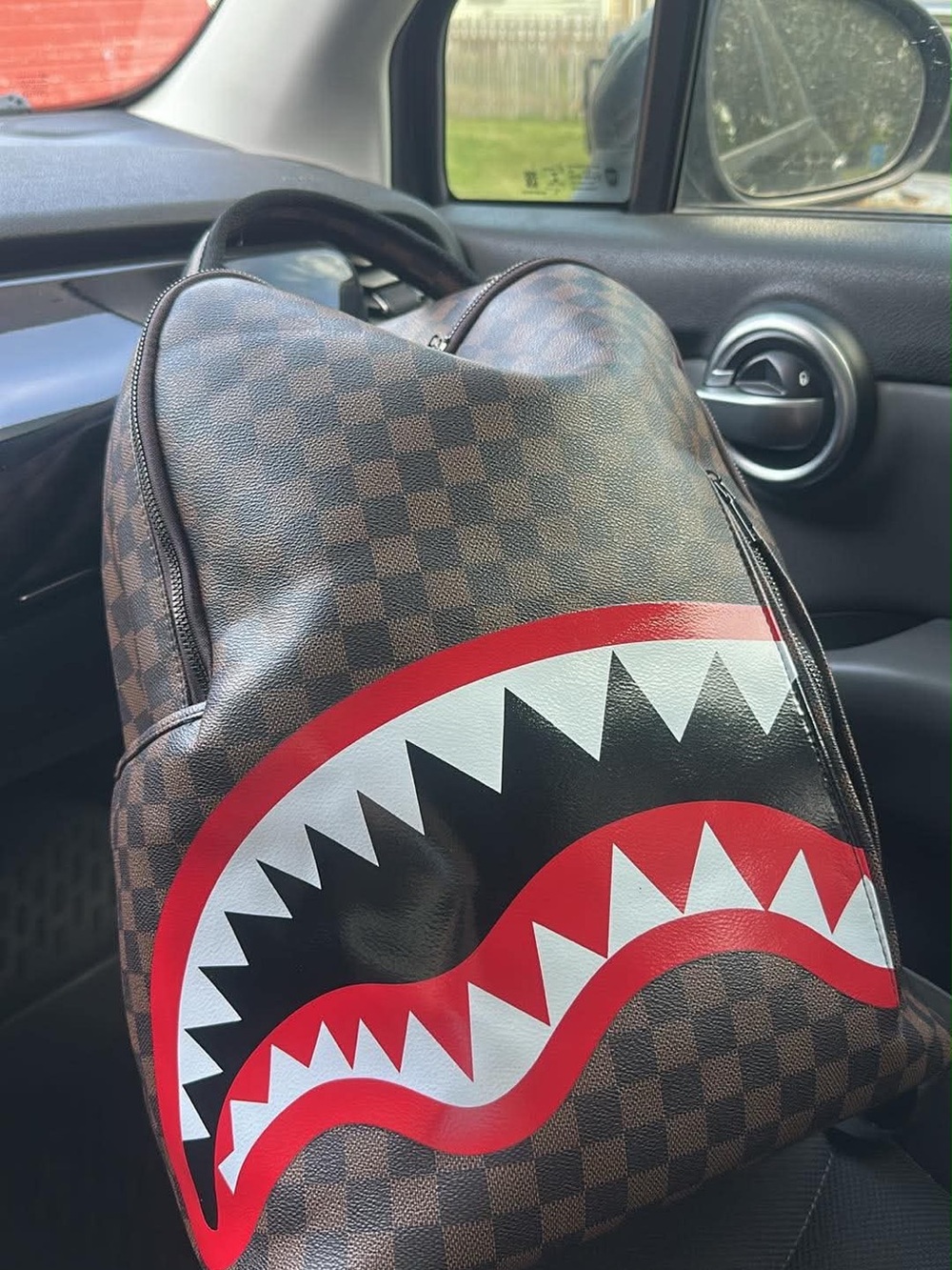 Men's Brown Checkered Backpack with Red & White Shark Graphic